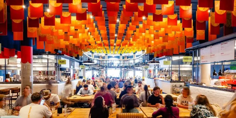 Vibrant local food hall packed with lunch crowds